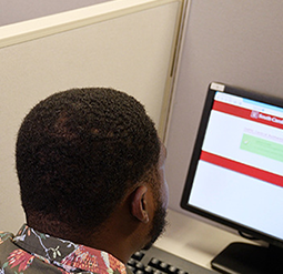 Student taking exam on computer