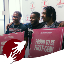 First-Gen students holding Proud to be First-Gen sign