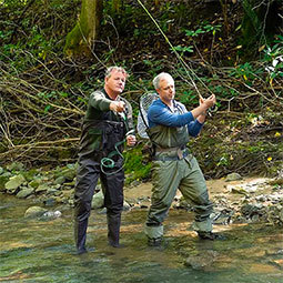 William Dissen William Dissen fishes in a river