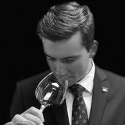 Beaty Fisher samples a wine by testing its nose