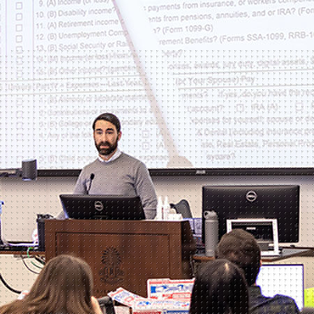 Tax Clinic director lecturing