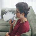 Teen using e-cigarette