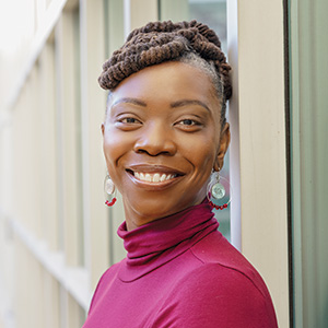 Colishia Dunbar smiles for the camera.