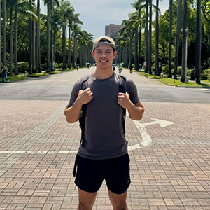 Raymond Ziemba stands in a road in Taiwan.